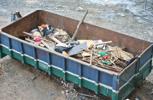 Commercial skip being delivered to a business site in Queens Park