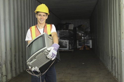 A clean-up in progress with a hired skip in Queens Park
