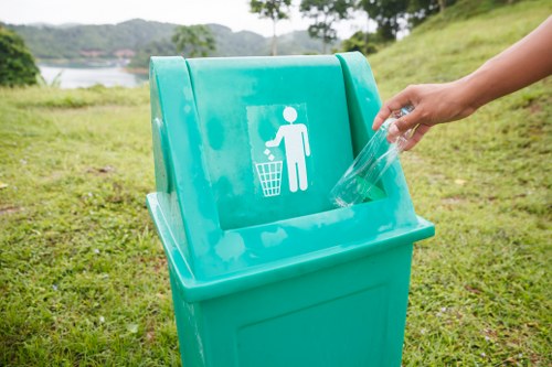Eco-friendly waste removal equipment in use in Queens Park